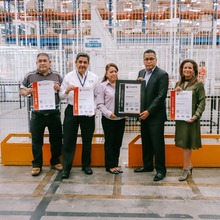 The CLA GDL team obtaining the ISO 9001:2015 recertification. 