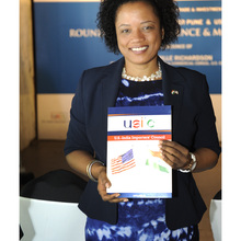 Ms. Camille Richardson showcasing the USIIC published 'Bridging Two Great Trade Partners' 