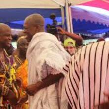 Chairman of WTC Accra , Togbe Afede XIV shaking hands with the Vice President of Ghana at the durbar grounds